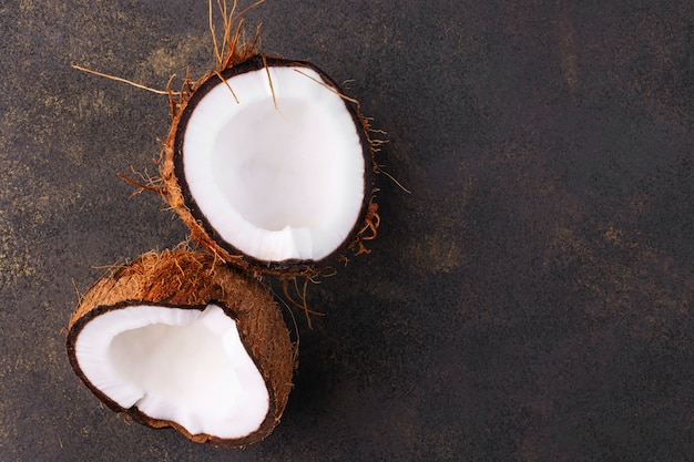 Broken coconut close-up with copy space