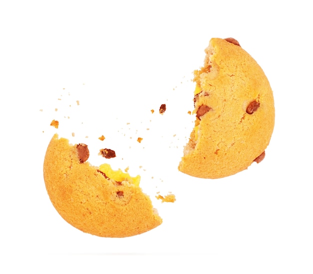 Broken cookies in flight on white background