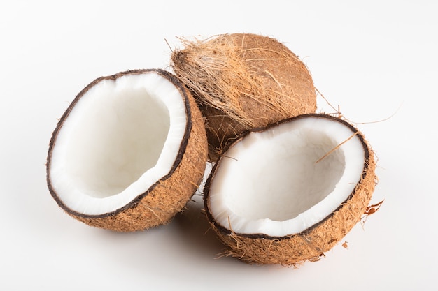 Broken dry coconut isolated on white background