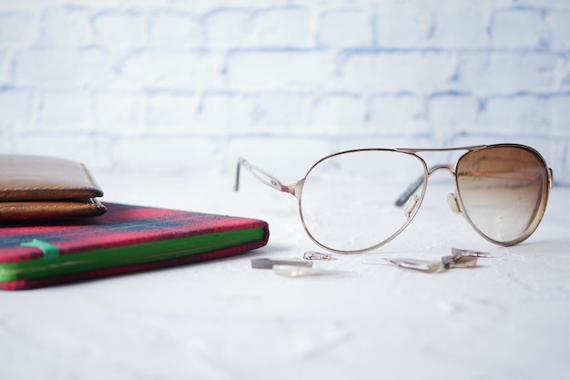 Broken eye glass on table with copy space