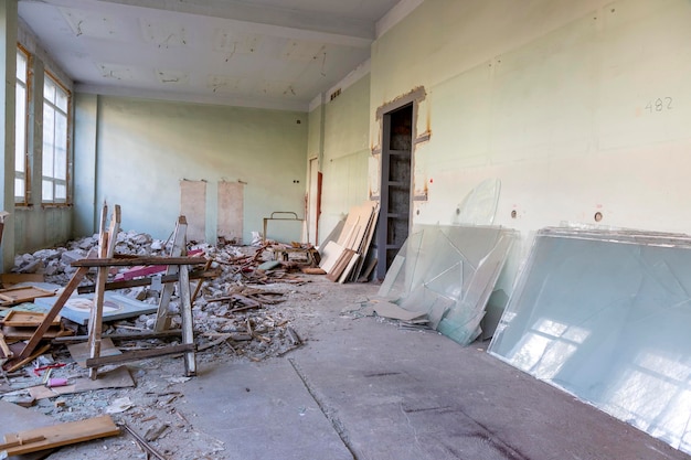 Broken floor trash and clutter in an abandoned room