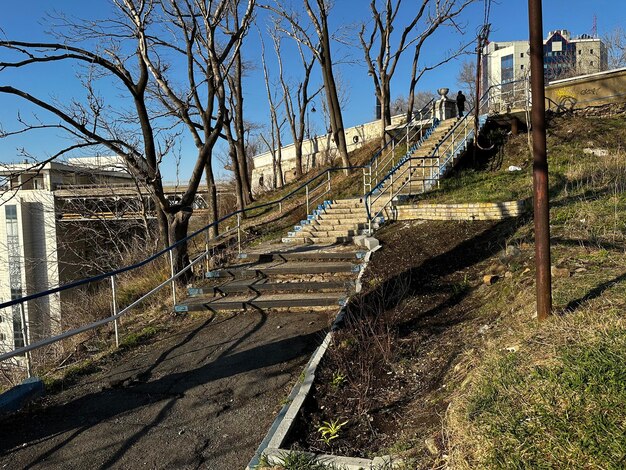 Broken old neglected stairs with handrail