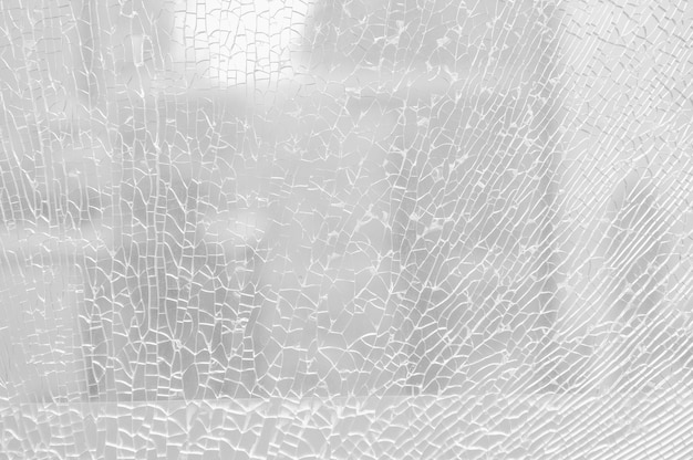 Broken safety glass, cracked glass.