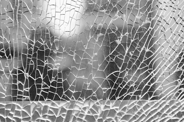 Broken safety glass, cracked glass.