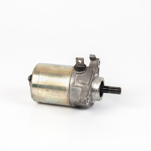 Photo broken starter motor for motorcycle on white background