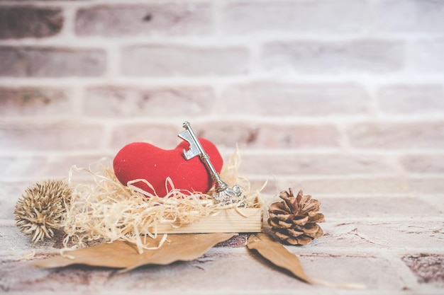 Bronze house key and red country fabric heart old wood Valentines Day