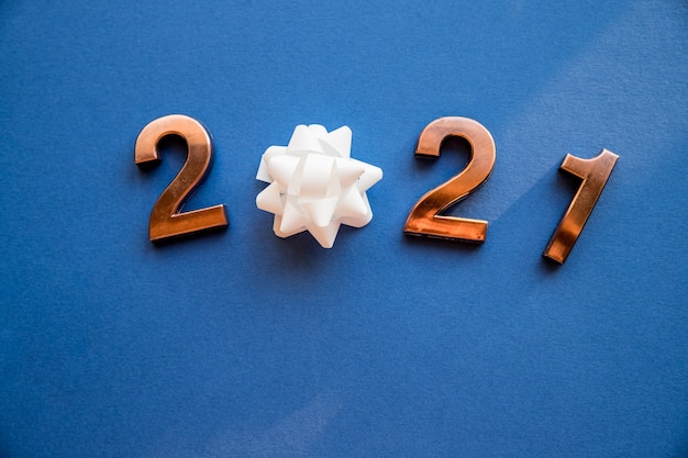 Bronze numbers with bow for new year