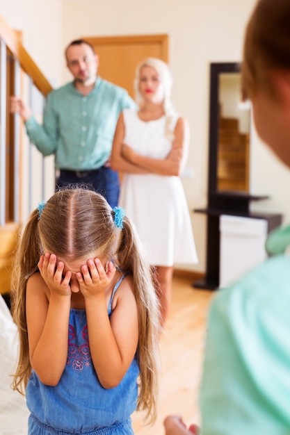 Brother is talking to her sister crying 