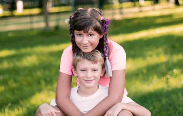 Brother and sister are having fun together at park