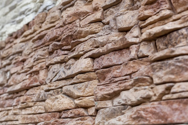 Brown background of different sizes and forms broken stones