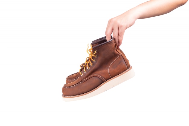 Brown boots on white background