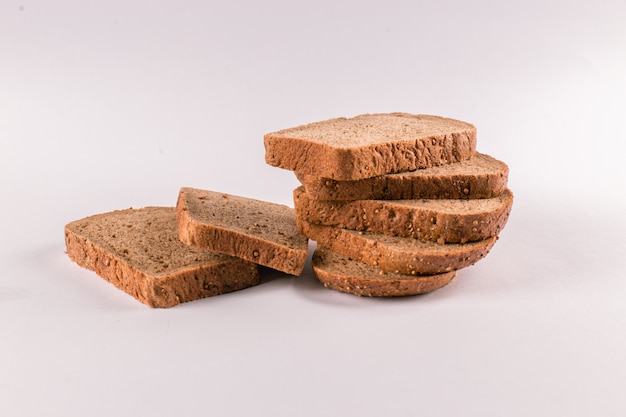 Brown bread slices on pile