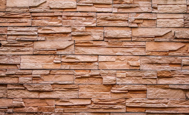 Brown brick wall or stone wall texture and background