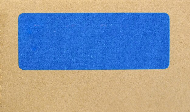 Brown cardboard with blue label