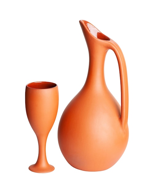 A brown clay jug with a cup isolated on a white background