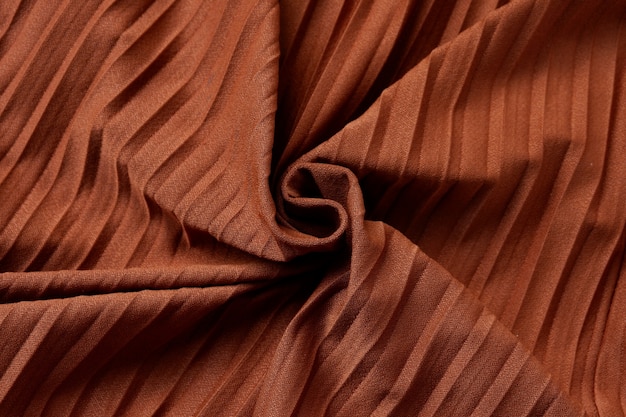 Brown cloth background texture, close-up of beautiful brown cloth