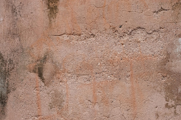 Brown color old damaged plaster wall surface for texture