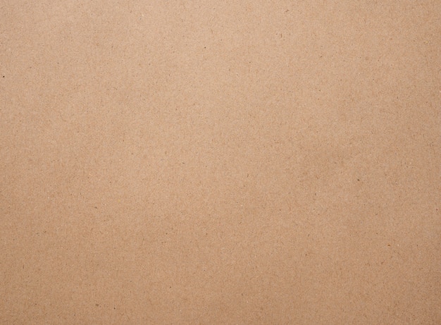 Brown kraft paper texture background of paperboard sheet