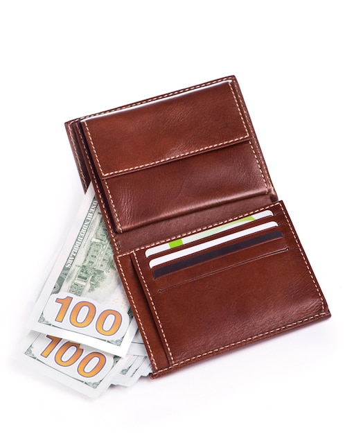 Brown leather wallet with money isolated on white background