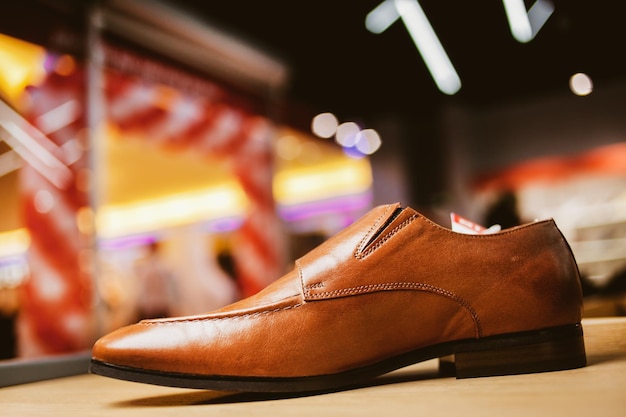 Brown men's shoes on the stand Male style fashion vintage photo processing