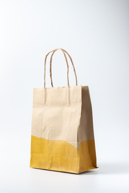 Brown paper bag on white background