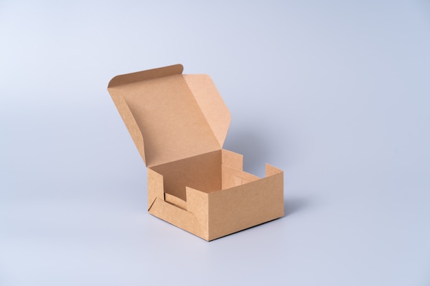 Brown paper box for food package. carton on a gray.