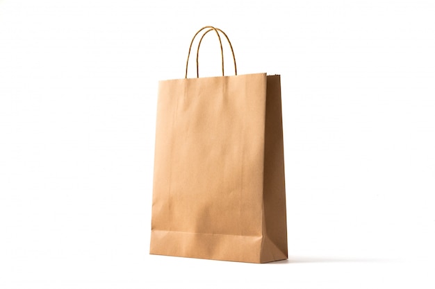 Brown paper shopping bag on white background