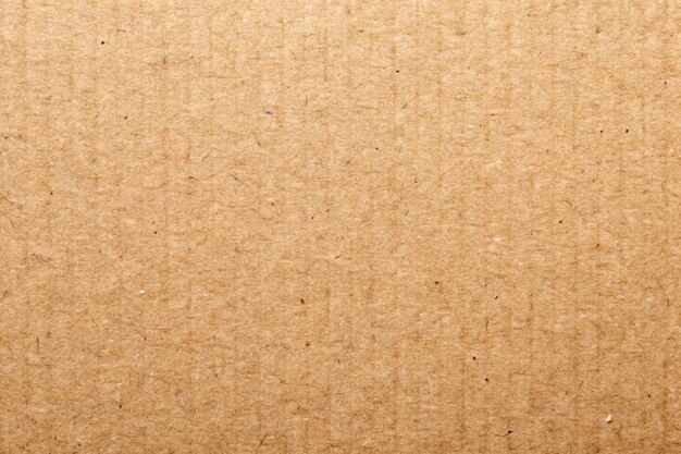 Brown paper texture background or cardboard surface from a paper box for packing and for the designs decoration and nature background concept