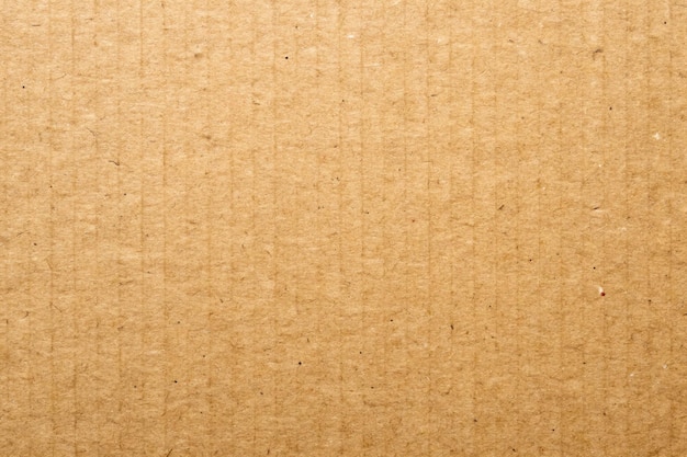 Brown paper texture background or cardboard surface from a paper box for packing and for the designs decoration and nature background concept