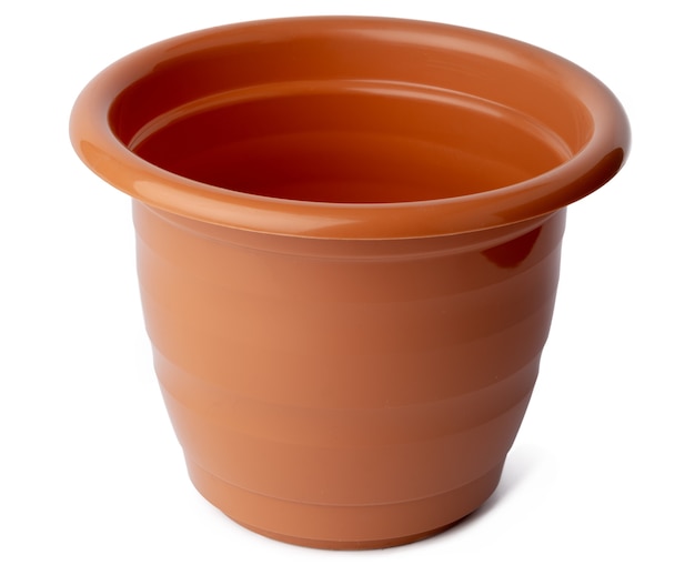 Brown plastic flower pot isolated on white