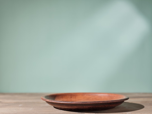 Brown plate on the kitchen table