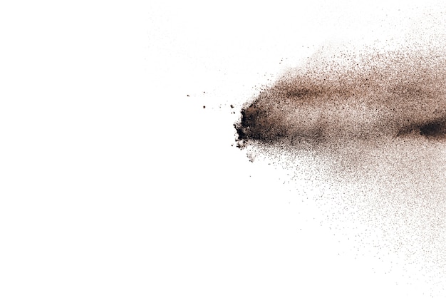 Brown powder explosion isolated on white background.