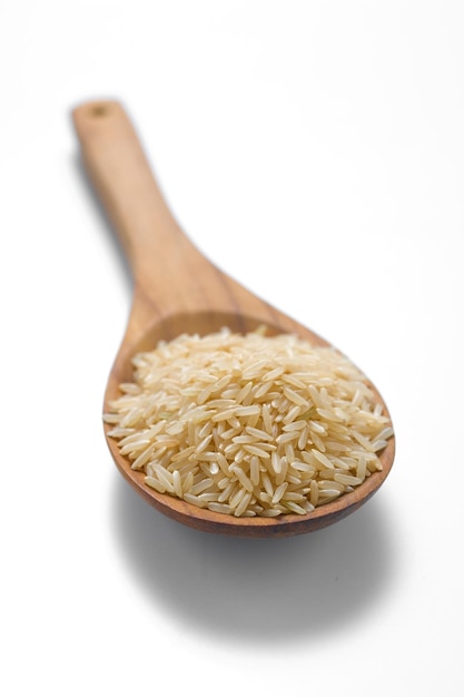 Brown rice in the wood spoon