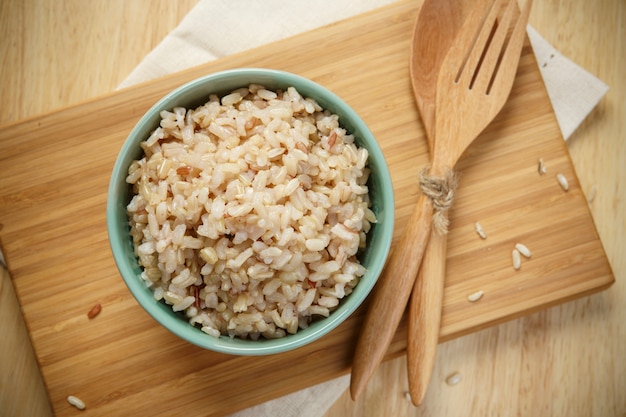 Brown Rice on Wooden Plate