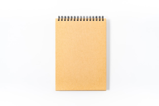 Brown spiral notebook isolated on white background.top view