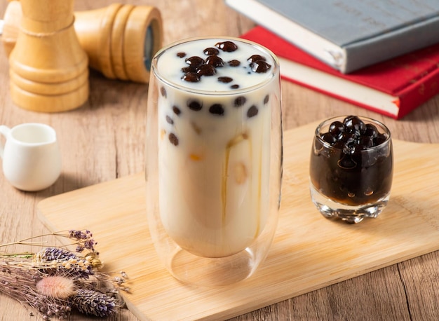 Brown Sugar Pearl Thick Soy Milk served in glass isolated on table top view of asian food