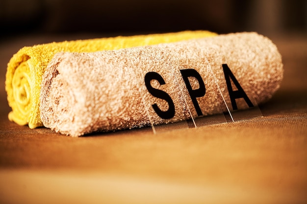 Brown towel in hotel room of spa treatment