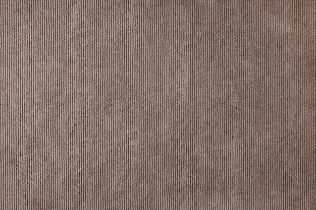 Brown velveteen upholstery fabric texture background