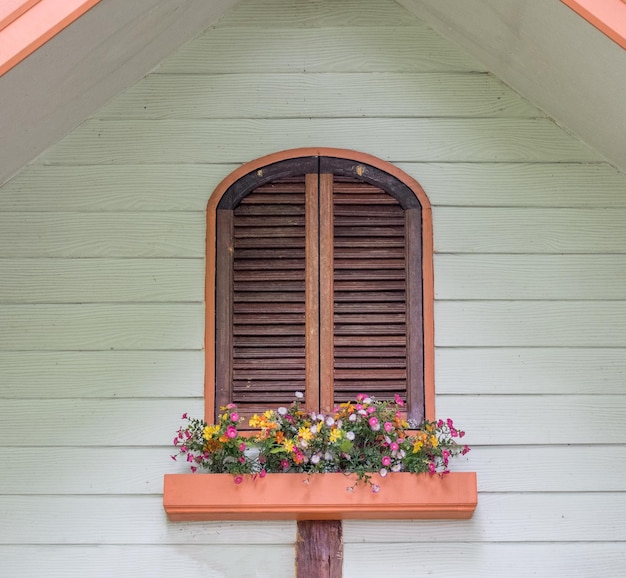 Brown window wooden with flower decoration