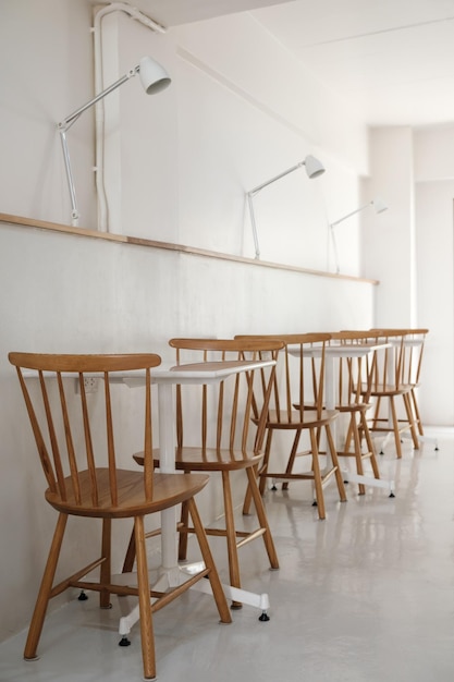 Brown wood chair and table in coffee cafe