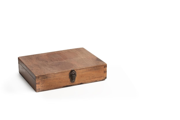 A brown wooden box on a white background with copy space