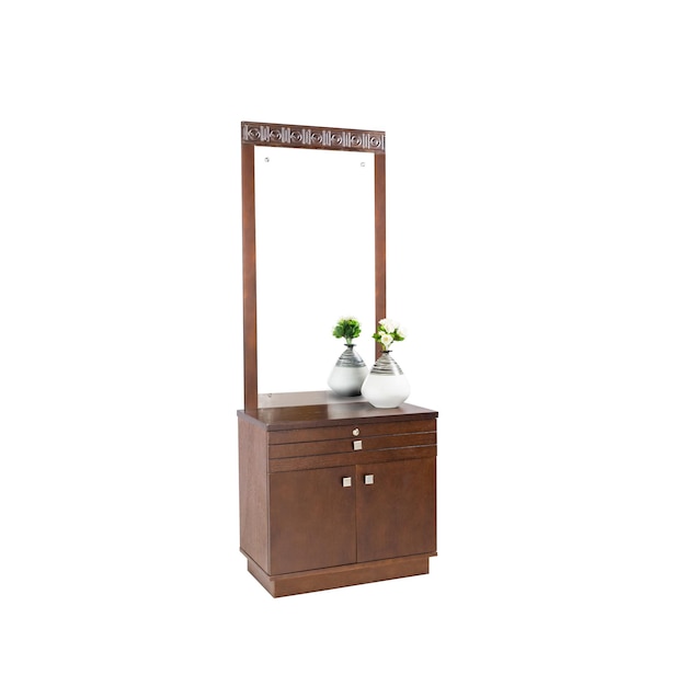 A brown wooden dresser with a mirror and a mirror with a green plant on it.