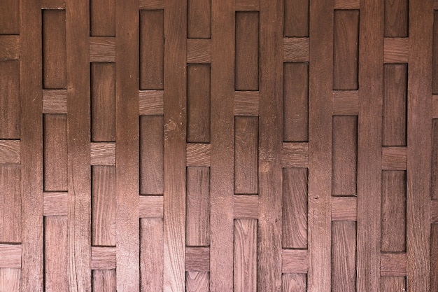 Brown wooden wall with vertical stripes