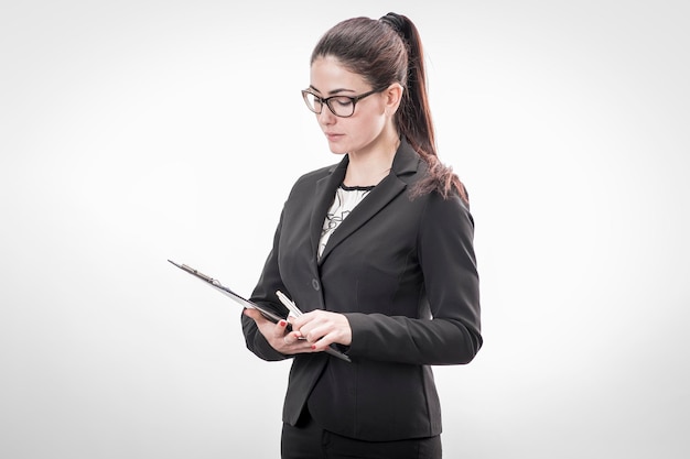 Brunette business lady with paper clip board