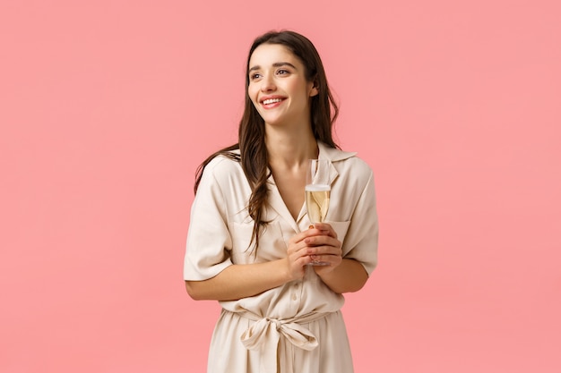 brunette girl holding champagne glass