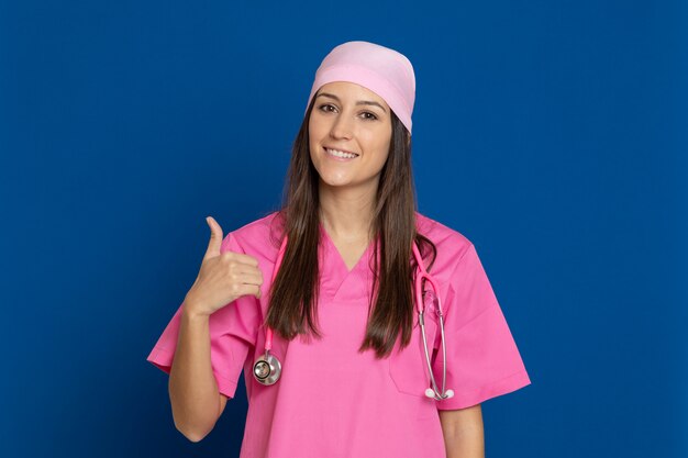 Brunette young woman wearing a pink T-shirt