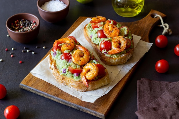 Bruschetta with shrimp guacamole and tomatoes Healthy eating Breakfast