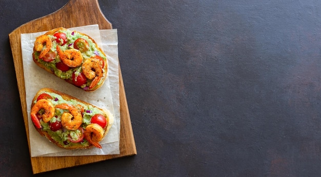 Bruschetta with shrimp guacamole and tomatoes Healthy eating Breakfast