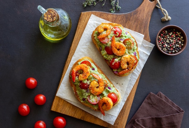 Bruschetta with shrimp guacamole and tomatoes Healthy eating Breakfast