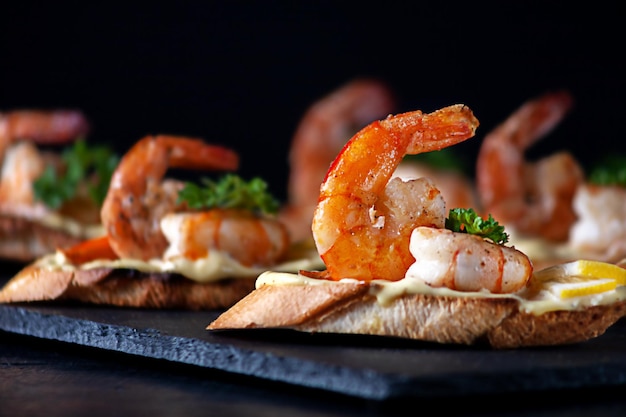 Bruschetta with shrimps mayonnaise and micro greens healthy eating concept